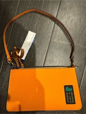 Dooney & Bourke Bright Orange Leather Wristlet with Contrast Strap